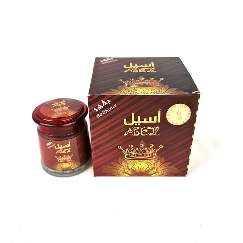 A product image showing Mabkharat AL-Khaleej Bakhour Aseel incense, which includes a jar of bakhour and a colorful box with branding and product name.