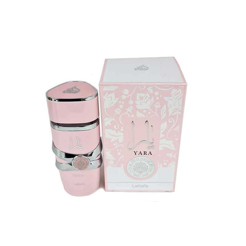 A pink bottle of Lattafa Yara women's perfume with a capacity of 100ml, accompanied by its packaging box which has floral designs and the brand's logo.