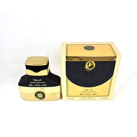 A gold-colored bottle of Ard AL Zaafaran Perfume Ajmal Ahlaam Oud EDP 100ml alongside its packaging box.