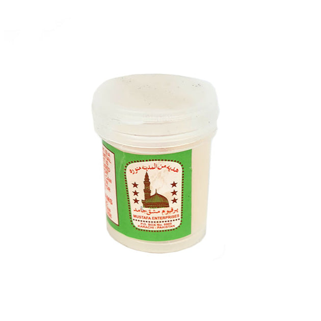 A white container with a green label, presumably containing a solid block of natural white musk perfume.
