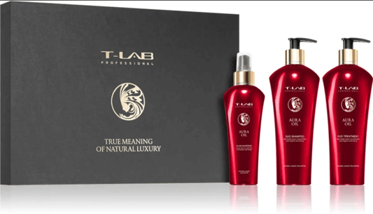 "T-LAB Professional Aura Oil hair care set with shampoo, conditioner, and nourishing oil in elegant packaging."