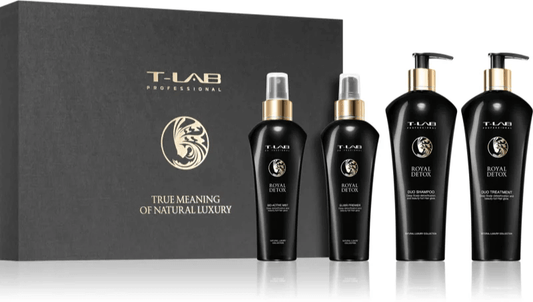 T-LAB Professional Royal Detox hair care set with shampoo, balsam, protective spray, and oil in elegant black packaging.