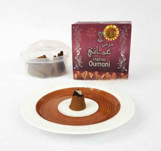 Harmi Oumani incense packaging with incense sticks on a white background