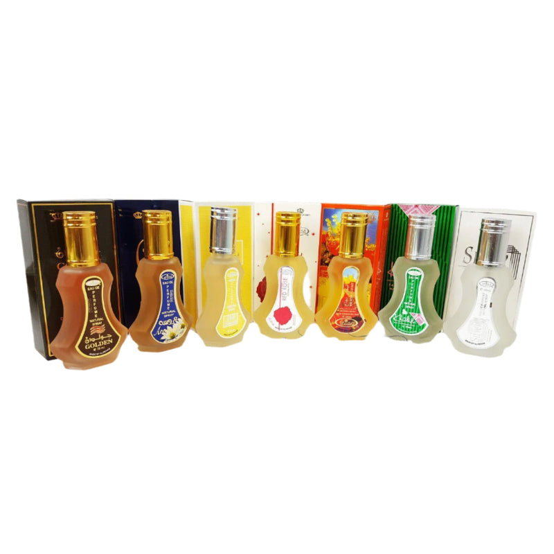 Set of small bottles with various labels on a white background