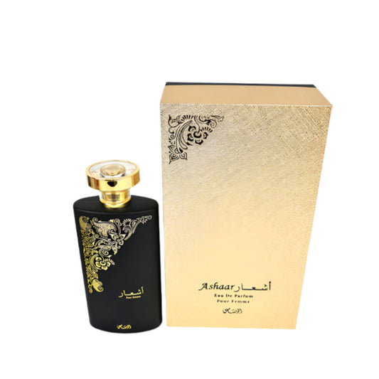 A bottle of Rasasi Ashaar Pour Femme Spray Perfume EDP 100ml alongside its packaging box with gold and black design elements.