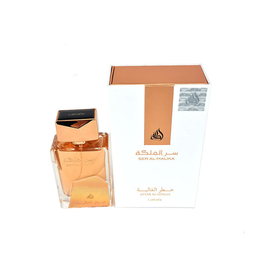 A product image featuring a perfume bottle with a gold cap and amber liquid, alongside its packaging box with Arabic text.