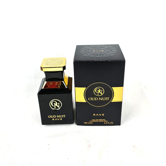 A black bottle of Lattafa Perfume Oud Nuit EDP with a gold-colored cap, alongside its packaging box.