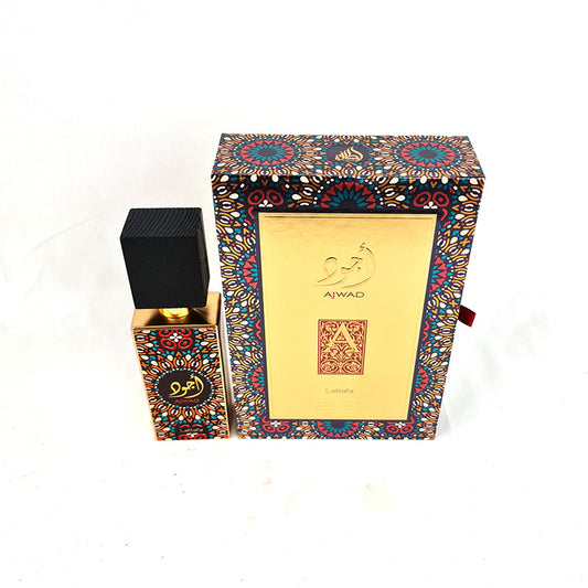 A perfume bottle with a black label and gold accents next to its decorative box, featuring a colorful patterned design. The perfume is named Ajwad and the size is 60ml EDP.