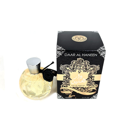 A black bottle of Ard AL Zaafaran Daar AL Haneen 100ml EDP Perfume with a silver cap, next to its packaging box which has gold and black decorations.