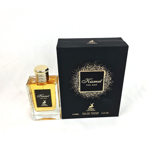 A bottle of Alhambra Maison Kismet For Men perfume alongside its black and gold packaging box.