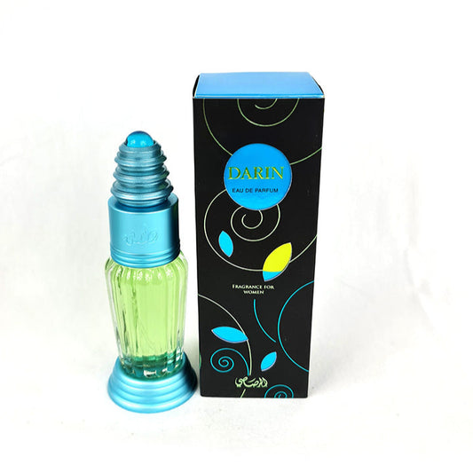 A bottle of Rasasi Darin women's perfume with a light blue cap and a black box with floral designs in the background.